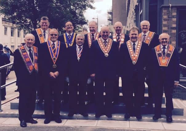 Senior local Orangemen, including Grand Master Edward Stevenson (front, third from right) at the last Imperial Orange Council, held in Liverpool, in 2015