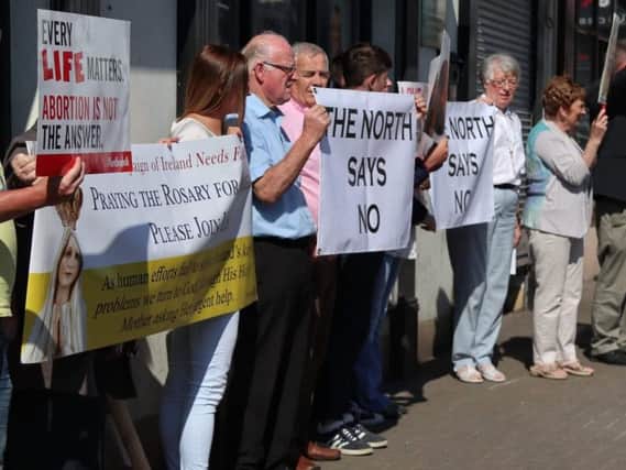 Members of Tyrone Pro-Life Network outside the Sinn Fein office in Coalisland