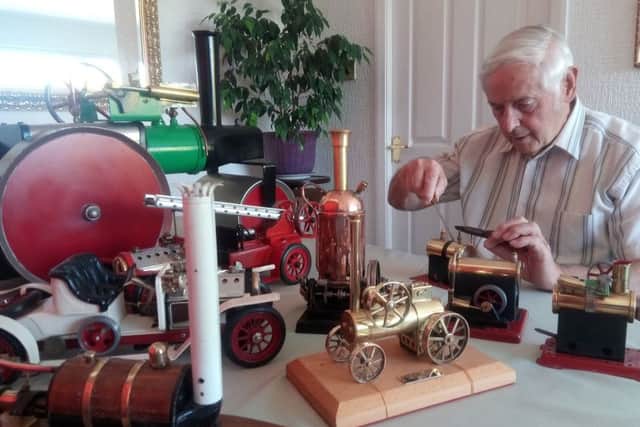 Brian Mehaffey with some of his steam-powered items