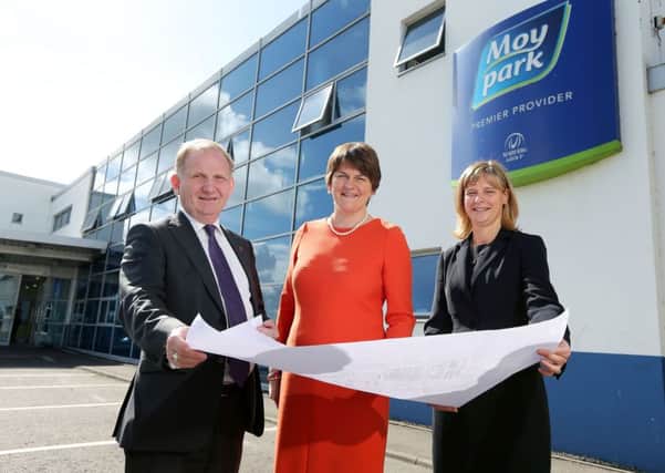 The DUP's Lord Morrow and Arlene Foster pictured with former Moy Park CEO  Janet McCollum