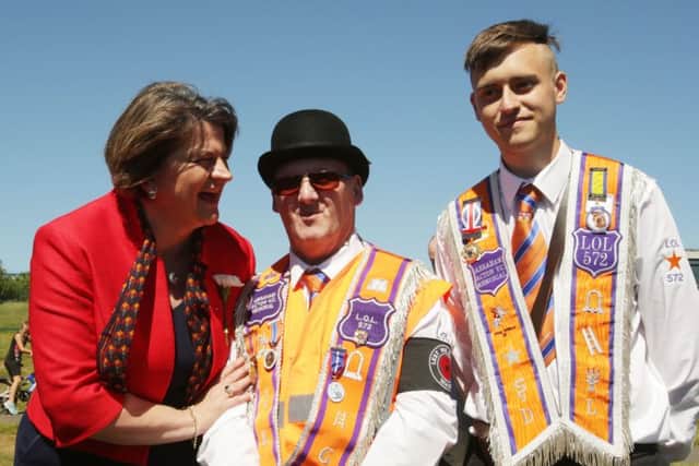 DUP leader Arlene Foster  with participants at an Orange Order march in Cowdenbeath, Fife.