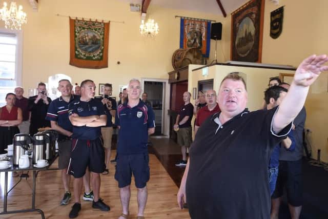 Noel Ligget, District Master, conducting the tour of the Orange Hall. Picture: Michael Cooper