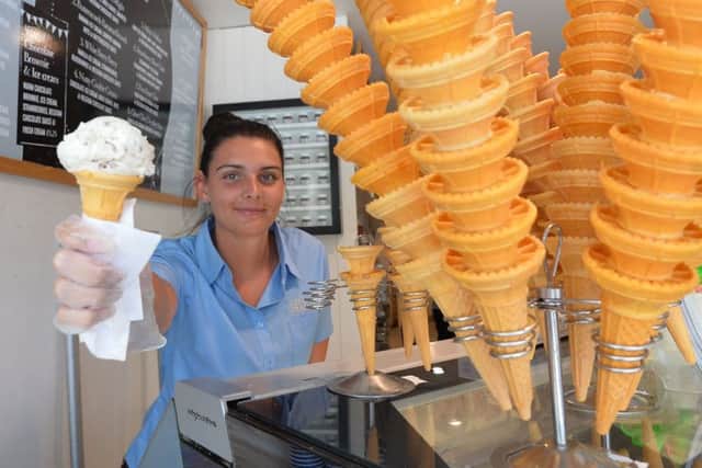 Aine McGinn serves up an ice cream at Cafe Mauds on the Lisburn Road, Belfast. Pic: Colm Lenaghan/Pacemaker