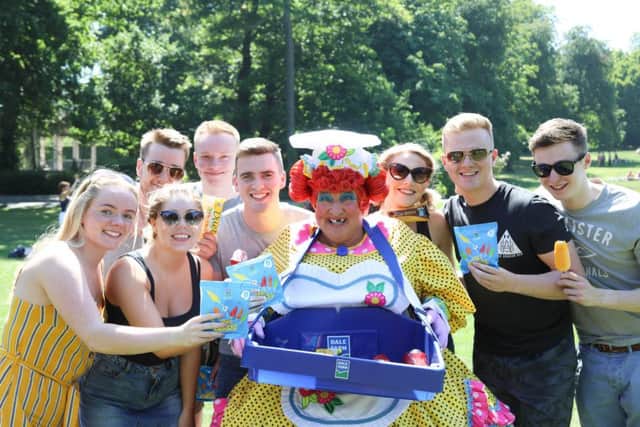 The stars of this years Grand Opera House panto surprised sunbathers in Botanic Gardens with some Dale Farm ice cream.