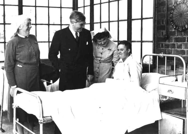 Handout file photo dated 05/07/48, issued by the Trafford Healthcare NHS Trust, of Aneurin Bevan talking to an NHS patient, at Trafford General, in Manchester, (formerly the Park Hospital) the NHS's "first" hospital, which he also opened: Trafford Healthcare NHS Trust/PA Wire