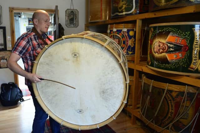 The News Letter's Graeme Cousins learning to play the Lambeg drum.
 Picture by Arthur Allison