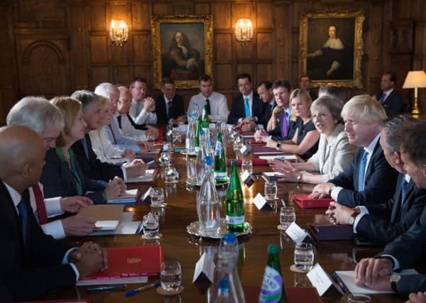 Theresa May holding a cabinet meeting at Chequers in Buckinghamshire in 2016. The Prime Minister is battling to keep her Cabinet together ahead of a crunch Brexit showdown at her country retreat.  Photo: Stefan Rousseau/PA Wire