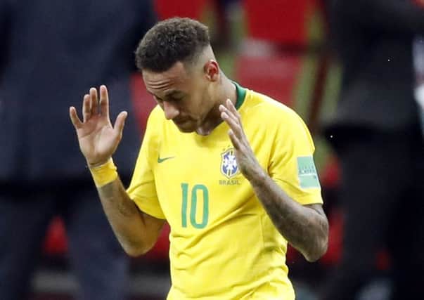 Brazils Neymar reacts after his side lost to Belgium last night