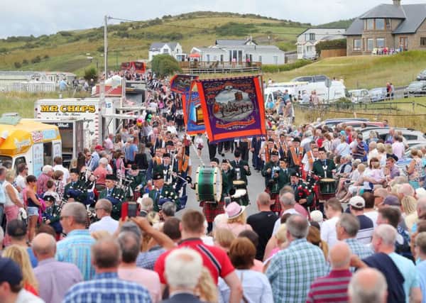 Crowds line the route of the annual Orange Order parade in Rossnowlagh, Co. Donegal. Pic by Jonathan Porter/PressEye