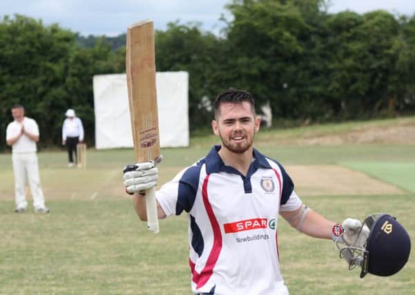 Newbuildings Stephen Wallace acknowledges the applause after securing his century in their win over Killyclooney.