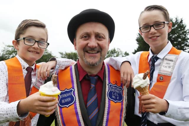 Twelfth Parade in Castlederg Co Tyrone 
Aaron Burke LOL 34 Fintonia District No 8 with his sons James and Thomas Burke LOL 250.
Picture by Brian Little