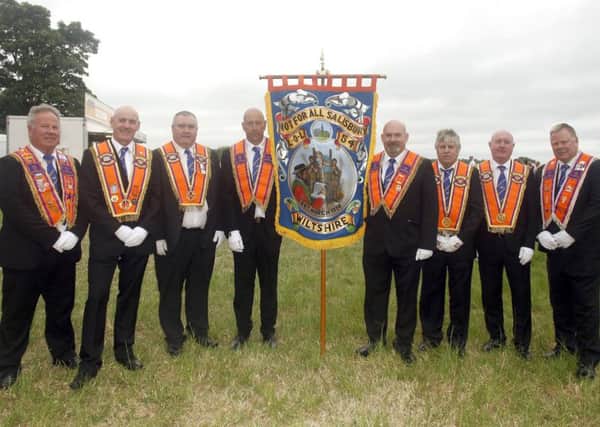 Wesley McKelvey (WM) with members of lodge LOL 54 Not For All Salisbury, Wiltshire attending their first 12th demonstration in Aghalee.