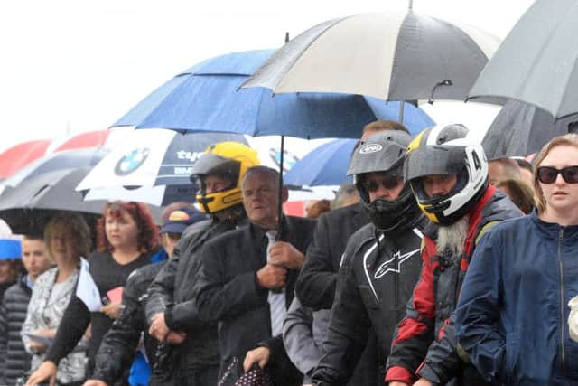 A huge crowd of mourners braved the rain at motorcycle racer William Dunlops funeral at Garryduff Presbyterian church outside Ballymoney