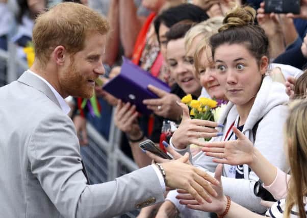 Prince Harry meeting members of the public at Trinity College, Dublin