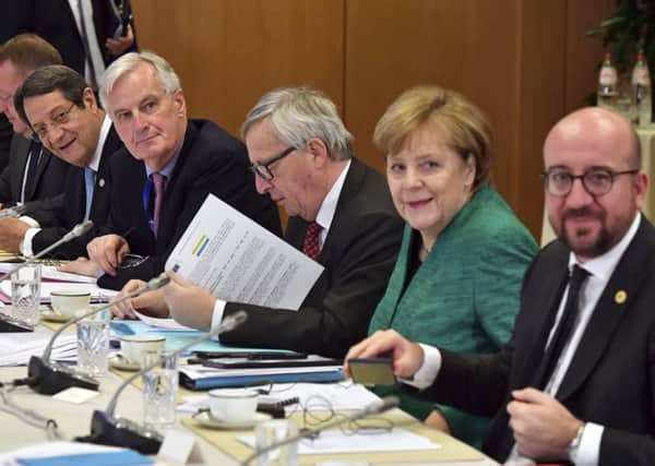 EU leaders attend a round table meeting regarding Article 50 at an EU summit in Brussels on Friday, Dec. 15, 2017.