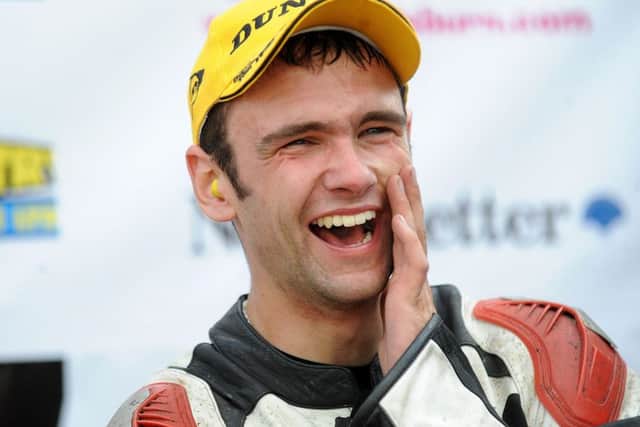 William Dunlop is all smiles after finishing on the rostrum in third place in the second Supersport 600 race at the Ulster Grand Prix in 2010.