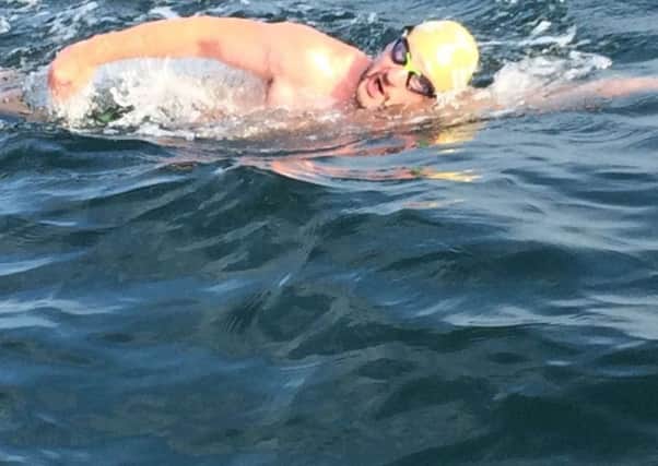 Marc Power was a part of a successful relay team who swam across the North Channel on July 5