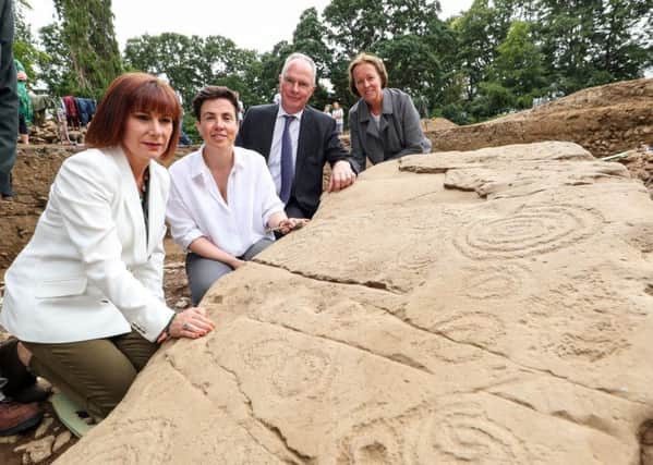 From left to right: Pictured at the recently discovered Megalithic passage tomb within the BrÃº na BÃ³inne World Heritage Site is: the Republic of Ireland Minister for Culture, Heritage and the Gaeltacht, Josepha Madigan, Dr ClÃ­odhna NÃ­ LionÃ¡in, Devenish's lead archaeologist, Devenish executive chairman Owen Brennan and his wife Professor Alice Stanton