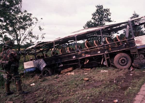 A soldier inspects the remains of the army bus which was  blown up by the IRA at Ballygawley in 1988, killing eight soldiers. One survivor tells the News Letter today how the resulting PTSD almost claimed his life and how he came out on top