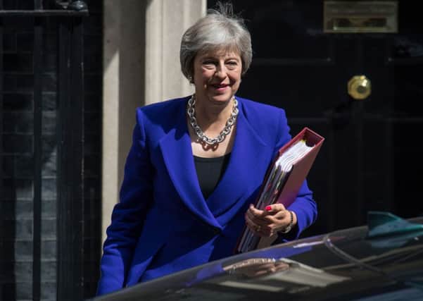 Prime Minister Theresa May leaves 10 Downing Street, London, on Wednesday July 18, 2018. She will be in Northern Ireland this week.  Photo: Dominic Lipinski/PA Wire
