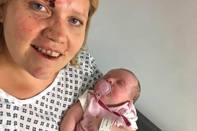 Clare O'Neill and her baby Eliza, after the four-week-old girl was inside an Audi which taken in a car-jacking in Birmingham.