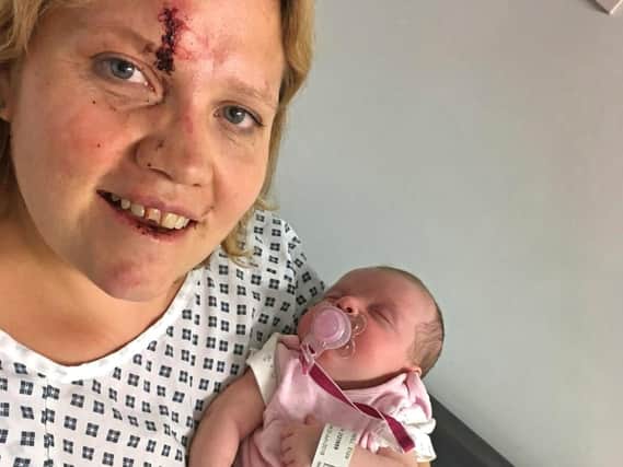 Clare O'Neill and her baby Eliza, after the four-week-old girl was inside an Audi which taken in a car-jacking in Birmingham.