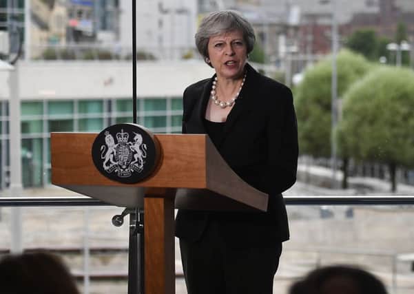 Prime Minister Theresa May during her speech at the Waterfront Hall in Belfast. Photo: Charles McQuillan/PA Wire