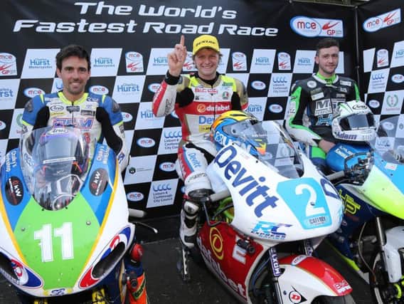 Ivan Lintin (centre) won the Supertwins race at the Ulster Grand Prix last year.