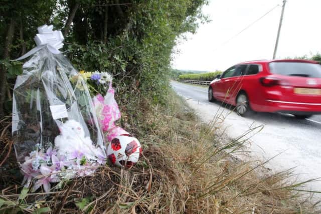 One of the floral tributes left at the scene of the crash near Banbridge