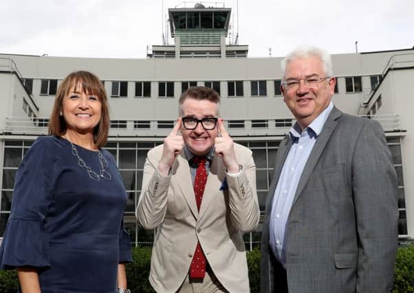David Meade, centre, at Dublin Airport with NI Chamber chief executive Ann McGregor and airport managing director Vincent Harrison