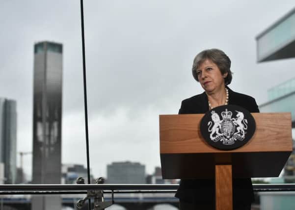 Prime Minister Theresa May during her speech at the Waterfront Hall in Belfast where she said that anything that would undermine a seamless border would be breach the spirit of the 1998 Belfast Agreement. Photo: Charles McQuillan/PA Wire