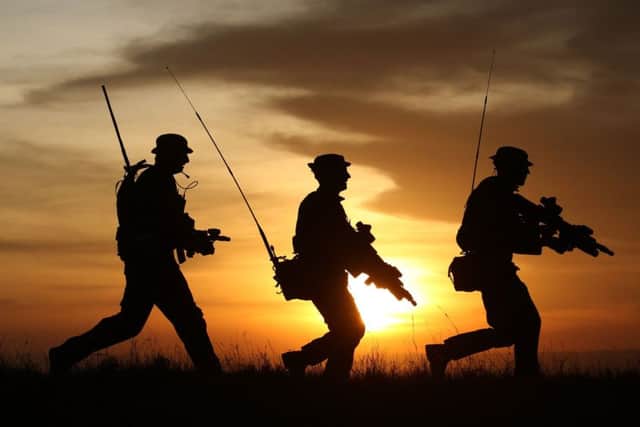 British soldiers on patrol. Photo: Andrew Milligan/PA Wire