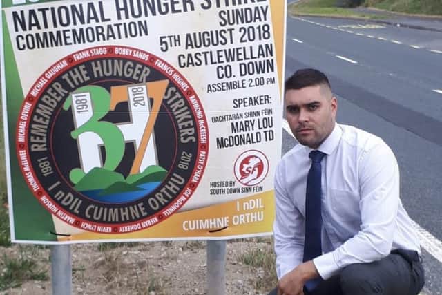 UUP South Down representative Alan Lewis beside one of the signs erected to advertise South Down Sinn Feins National Hunger Strike Commemoration in Castlewellan