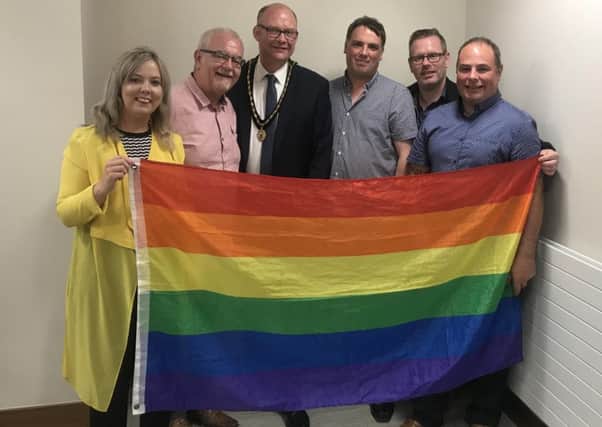 Sinn Fein councillors after a meeting of Armagh, Banbridge and Craigavon Council where a motion to fly the Rainbow Flag in support of Gay Pride was passed