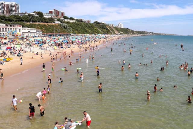 People enjoying the heatwave today on Bournemouth beach in Dorset on Wednesday as the hot weather continues across the UK, marking the driest start to a summer since modern records began in 1961. It reached 27.6 Celsius (82F) in Bournemouth yesterday while Wisley in Surrey rose to 32C (90F). Photo: Andrew Matthews/PA Wire