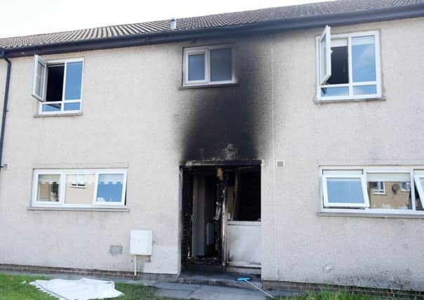 Fire and smoke damage was caused to the front of the Islay Street property. Picture by Jonathan Porter, PressEye