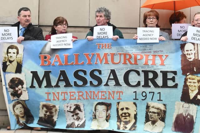 Families outside Belfast Court in April at a previous preliminary hearing of an inquest into the Ballymurphy killings: Picture: Colm Lenaghan/Pacemaker