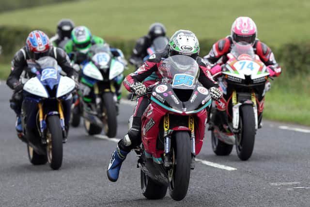 Adam McLean leads Paul Jordan and Davey Todd off the line in the Supersport race at Armoy on Friday evening.