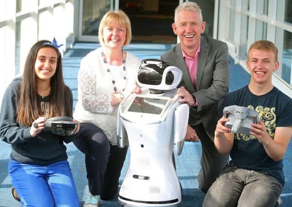 Dr Nicola Ayre, Associate Head of the School of Computing at Ulster University and Novosco managing director Patrick McAliskey pictured centre with students Yazmin Fitzpatrick and John Murphy