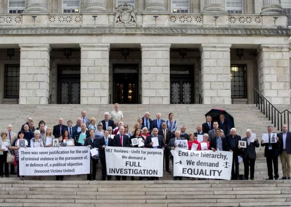 Victims and survivors of the Northern Ireland conflict attend a Innocent Victims United photocall at the steps of Parliament Buildings in the Stormont Estate, Belfast, before a meeting to discuss the NIO-led Legacy proposals whose origins connect with The Stormont House Agreement. Photo: Liam McBurney/PA Wire