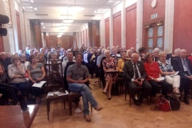 All seatts were taken at the charged legacy meeting at the long gallery in Stormont