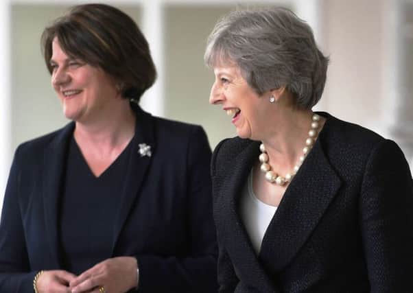 Arlene Foster (left) has an influential position with Prime Minister Theresa May  yet hasnt persuaded her to move on ending the Stormont vacuum
