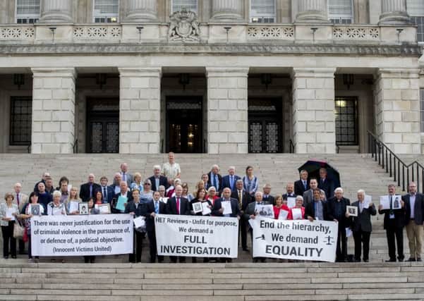 Victims and survivors of the Northern Ireland conflict attend a Innocent Victims United photocall at the steps of Parliament Buildings in the Stormont Estate, Belfast, before a meeting to discuss the NIO-led Legacy proposals whose origins connect with The Stormont House Agreement. Photo credit: Liam McBurney/PA Wire