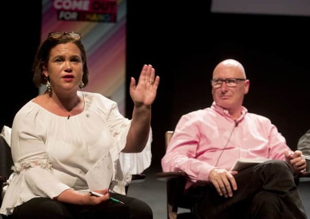 Sinn Fein President Mary Lou McDonald speaking as leader of the PUP Billy Hutchinson looks on, during the Belfast Pride political debate at The Mac Theatre in Belfast to address a wide range of equality issues in Northern Ireland at part of the 2018 Belfast Pride Festival. Photo credit: Liam McBurney/PA Wire