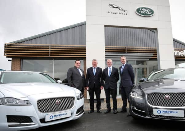 Group executive chairman Terence Donnelly, second left, with, from left, head of business, Donnelly Land Rover, Sean Donnelly, Geoffrey Lamont, site director at Dungannon and Group MD Dave Sheeran