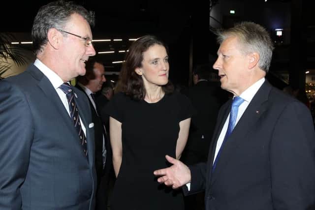 Peter Robinson (right) with former UUP leader Mike Nesbitt and former NI secretary of state Theresa Villiers, at the 2012 dinner celebrating the Covenant centenary