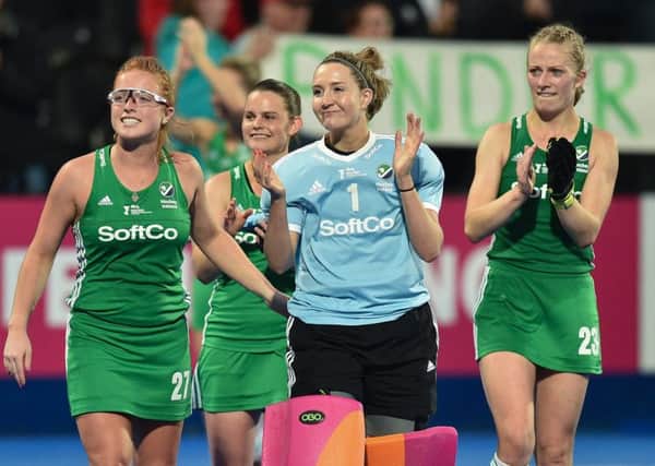 Ireland's Zoe Wilson, Grace OFlanagan and Hannah Matthews applaud fans