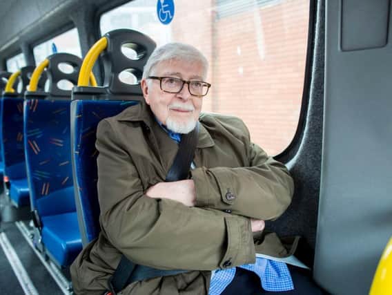 Retired civil servant Hilary Connolly, 82, from Belfast using a door-to-door service for those with mobility problems funded by the Infrastructure Department. Charity Disability Action who organises the buses, said services had just been reduced due to funding pressure after a 5% funding cut to accessible transport