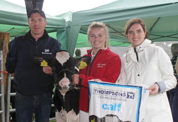 Holstein Young Breeders' Club member Lauren Henry, centre, is pictured with sponsors of the club's forthcoming calf show at Ballymena. World Wide Sires, represented by Dennis Torrens, is sponsoring the showmanship classes; while Thompsons, represented by Carolyn McKendry is supporting the calf classes. Picture: Julie Hazelton
