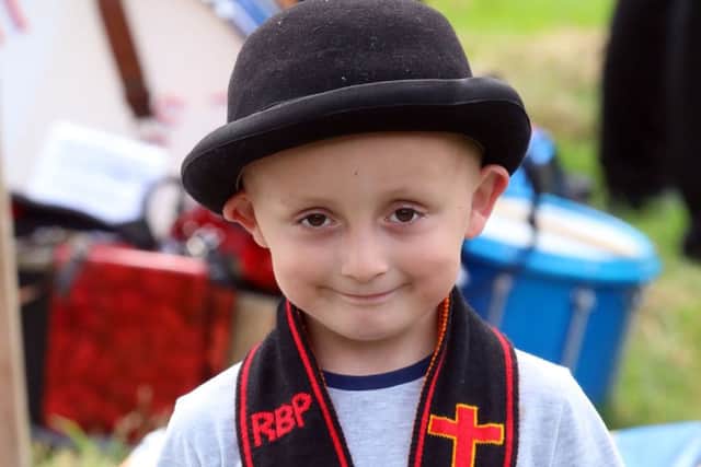 Lewis Maguinness, Shankill Belfast, enjoying the County Fermanagh Grand Black Chapter Annual Parade in Ballinamallard, Co Fermanagh.
 Picture by John McVitty